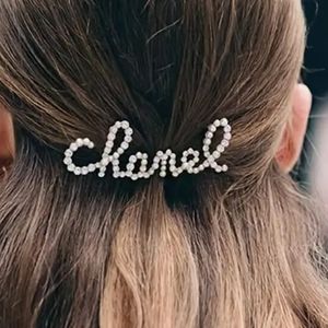 Gold Chanel barrette